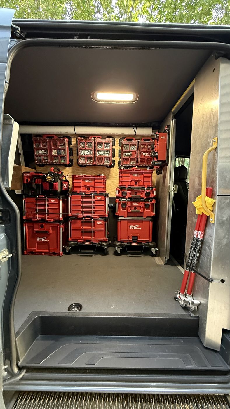 Organized tool and parts storage inside an EIT Networks van